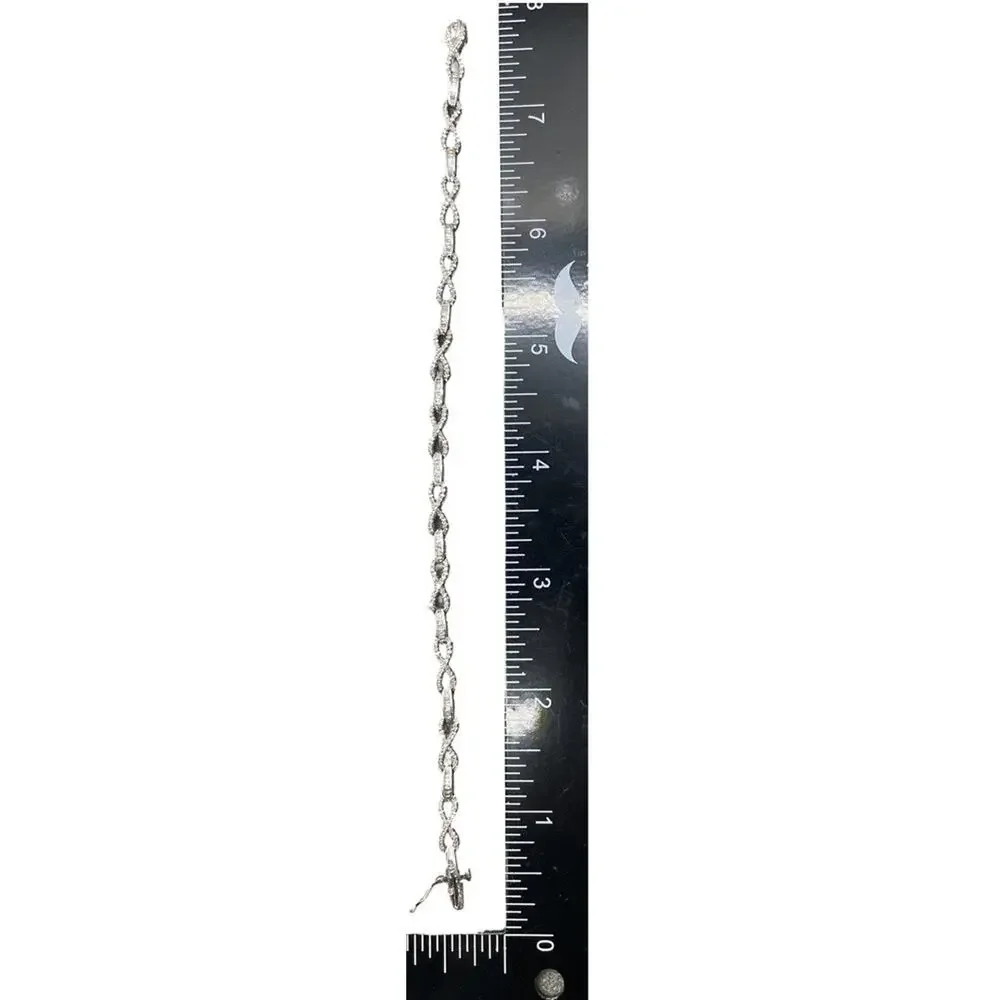 10K White Gold Diamond Infinity Design Bracelet (22102)